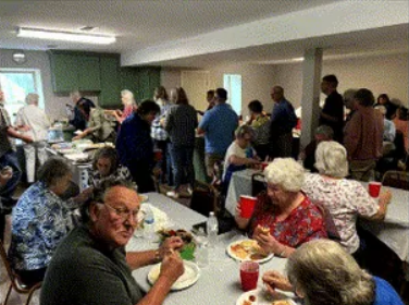 Mission Point Fellowship members sharing food