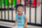 A child with Tulsa Police stickers on his face.