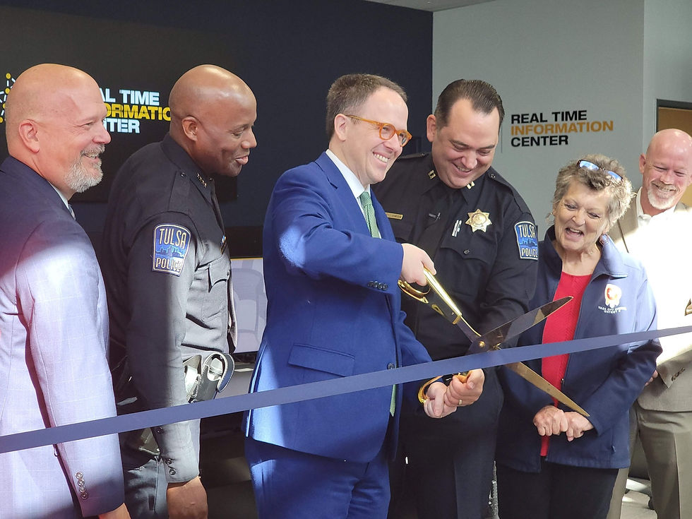 Tulsa's mayor, police chief and others cut the ribbon for the Real Time Information Center's grand opening