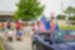 A parade of Tulsans celebrating the 4th of July