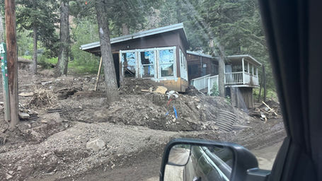 A photo showing damage from flooding around the U.S.