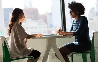 Two woman sitting in a cafe
