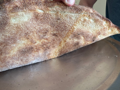 under side of pizza crust