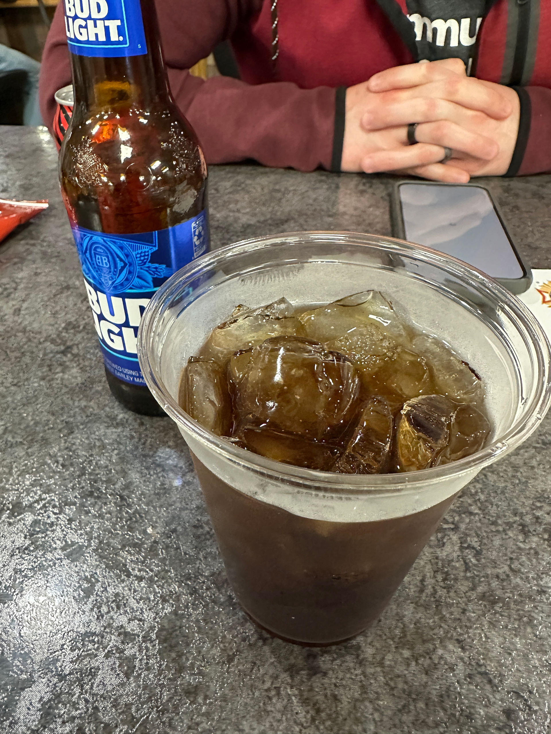 bud light bottle and whiskey and coke in a plastic cup at vfw in noblesville indiana