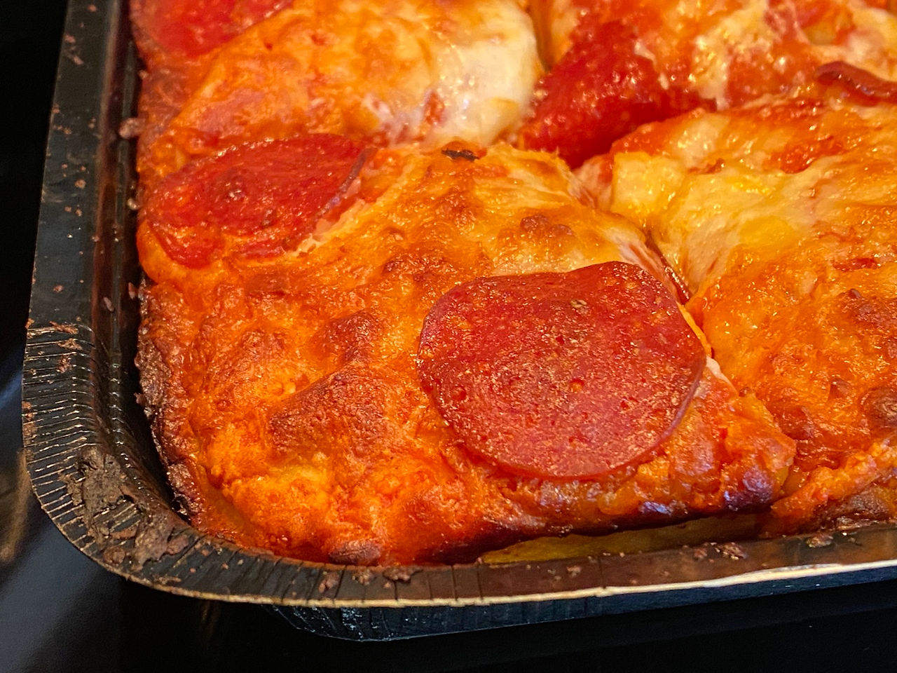 photo of pepperoni pan crispy edges