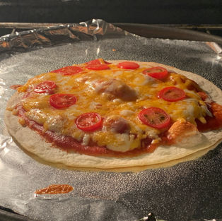 tortilla pizza with mexican cheese