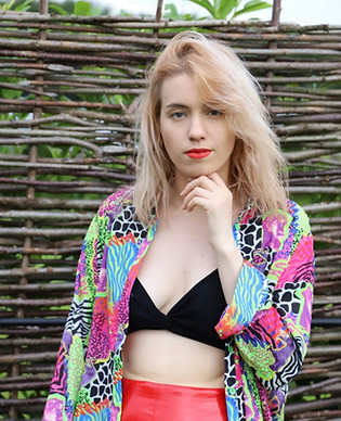 Model pouting and looking at camera