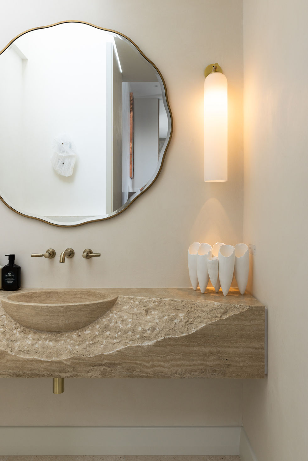 Powder room custom stone bench