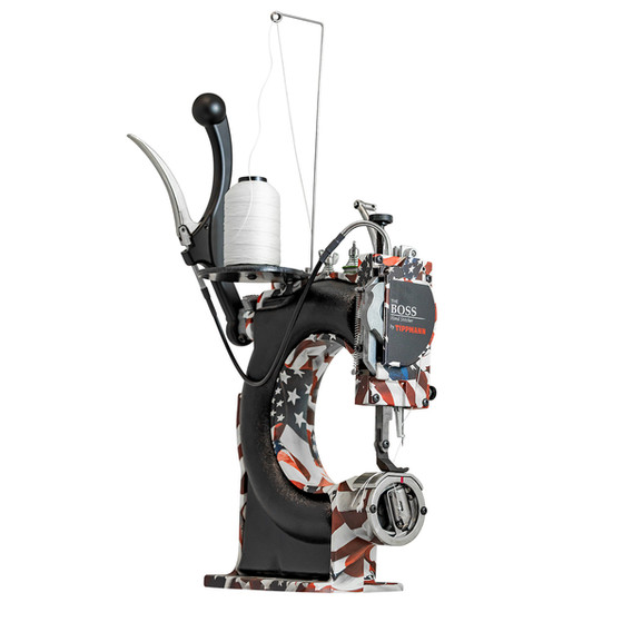 Industrial sewing machine with American flag design and white thread spool. Tippmann Industrial.