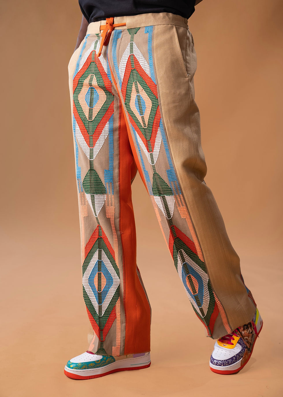 Thumbnail: Wide-leg trousers in Aso oke and Akwete