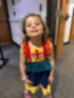 Young girl smiling at school