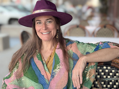 Mindy Arbuckle smiling in purple hat (Start Here Be More You)