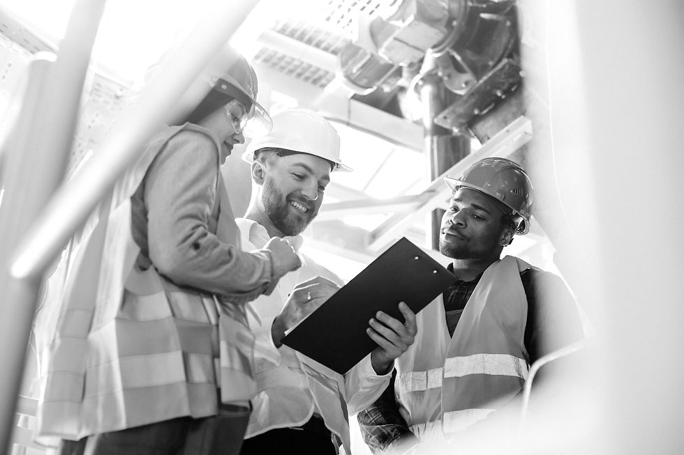 three-people-discussing-plan-factory.jpg