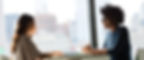 two women sitting beside table and talking_edited_edited.jpg