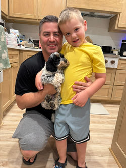 Family picture with a new puppy