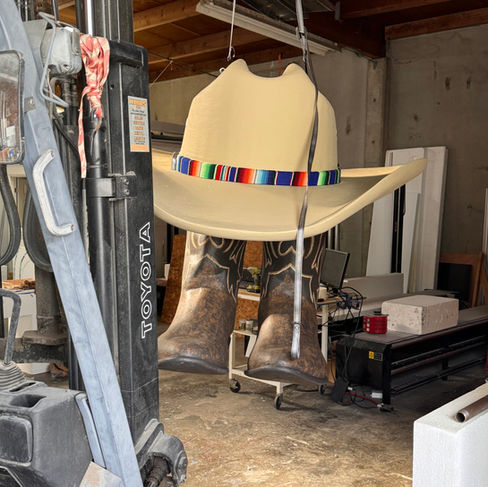 Hanging cowboy hat and boots oversize foam props hard coated and painted fabricated by WeCutFoam