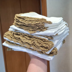 Muslin consignment with gold crochet edging