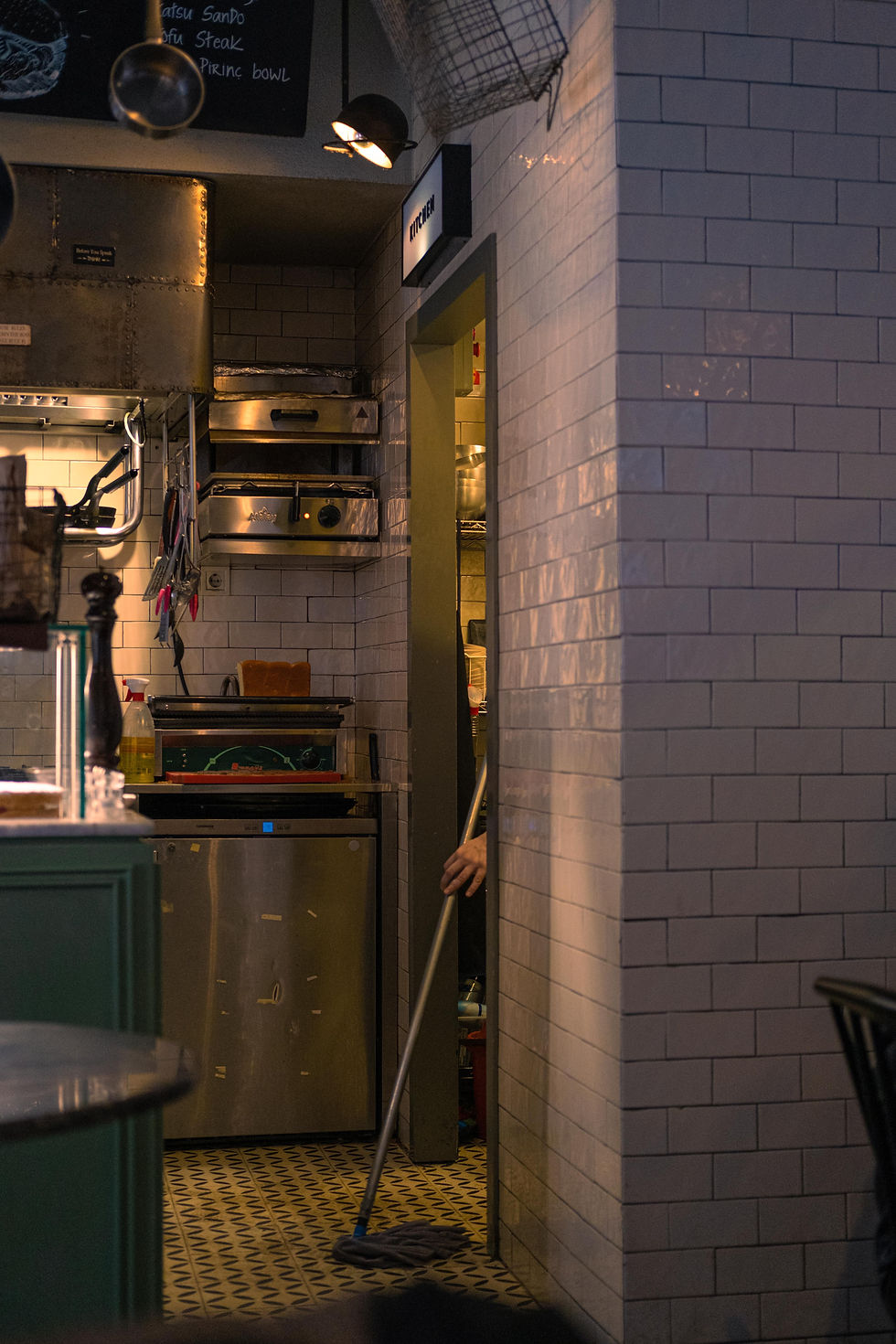 “Kitchen Chronicles: Mop at Work”