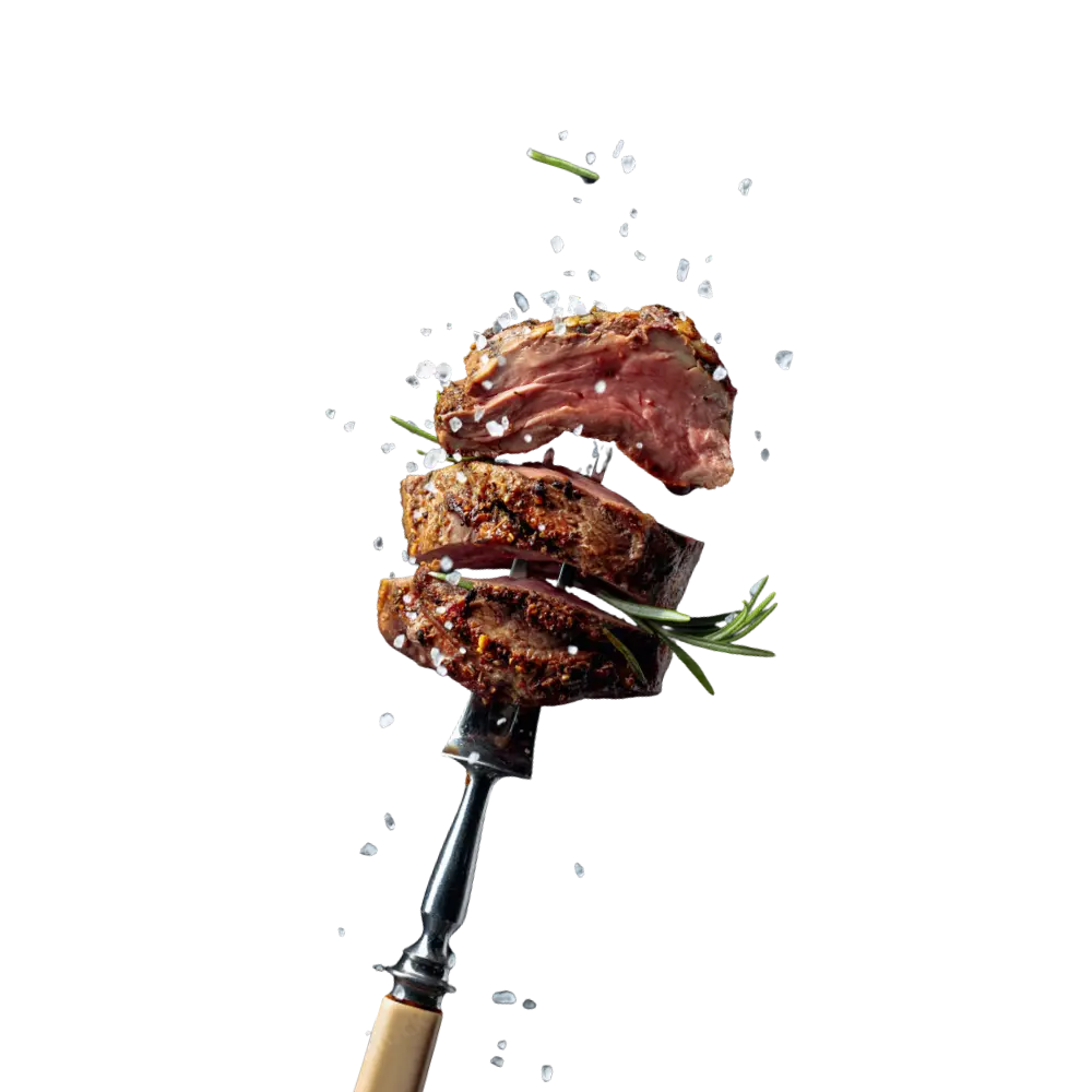 Viande piquée sur une fourchette