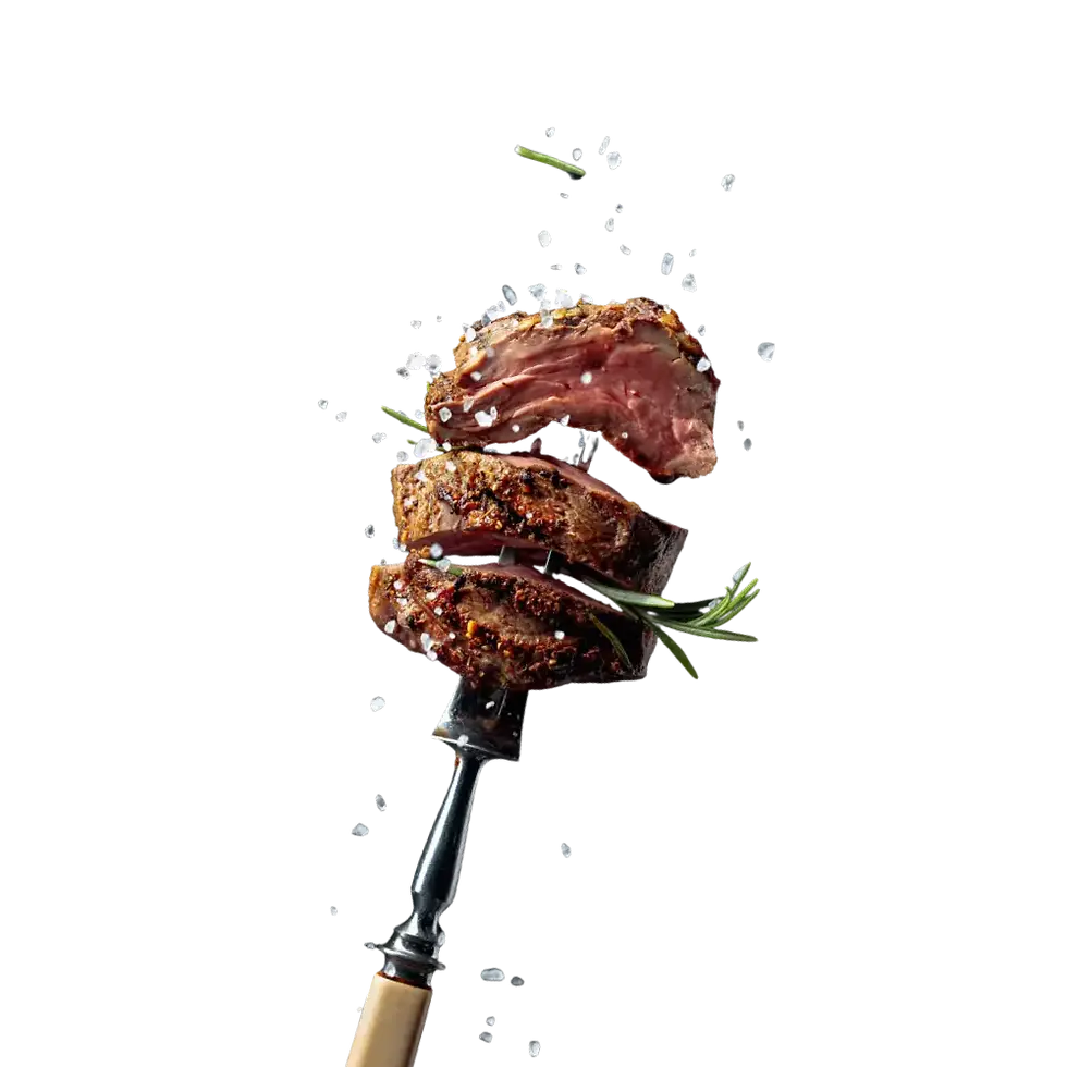 Viande piquée sur une fourchette