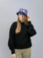 tie-dyed bucket hat in purple, blue, and yellow colours from the front