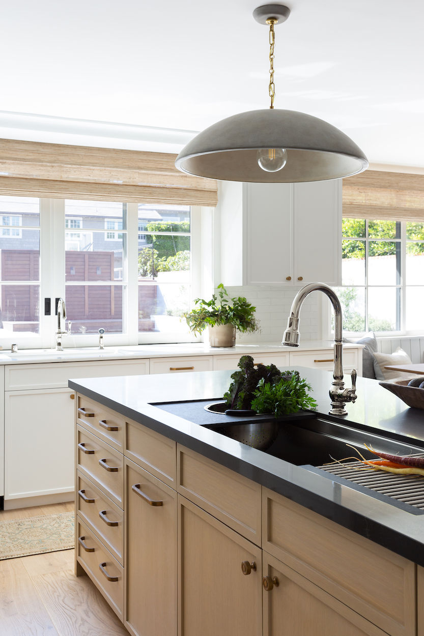 light Oak kitchen island with black counters by Lindsey Brooke Design