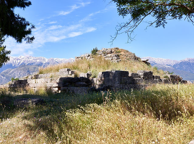 The ruined terrace of the Menelaion near Sparta with snow-capped Mount Taygetus beyond