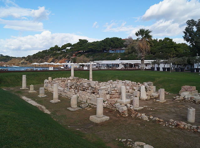 Stone foundations of the Temple of Apollo Zoster near the sea at Vouliagmeni