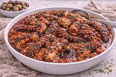 Octopus Krasato: Tender octopus slow-simmered in red wine sauce.