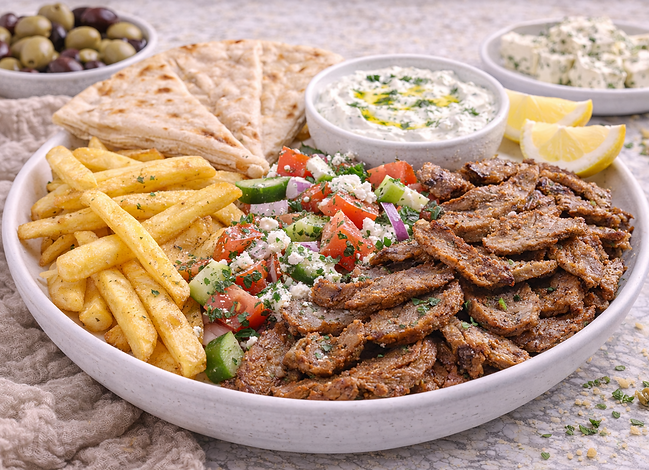 Gyro Merida (Plate): Sliced rotisserie meat with pita, onions, and fries.