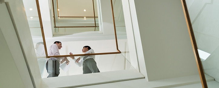 Businessmen on Staircase