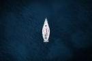 aerial-view-of-a-boat-in-the-blue-sea-V3V92E9.jpeg