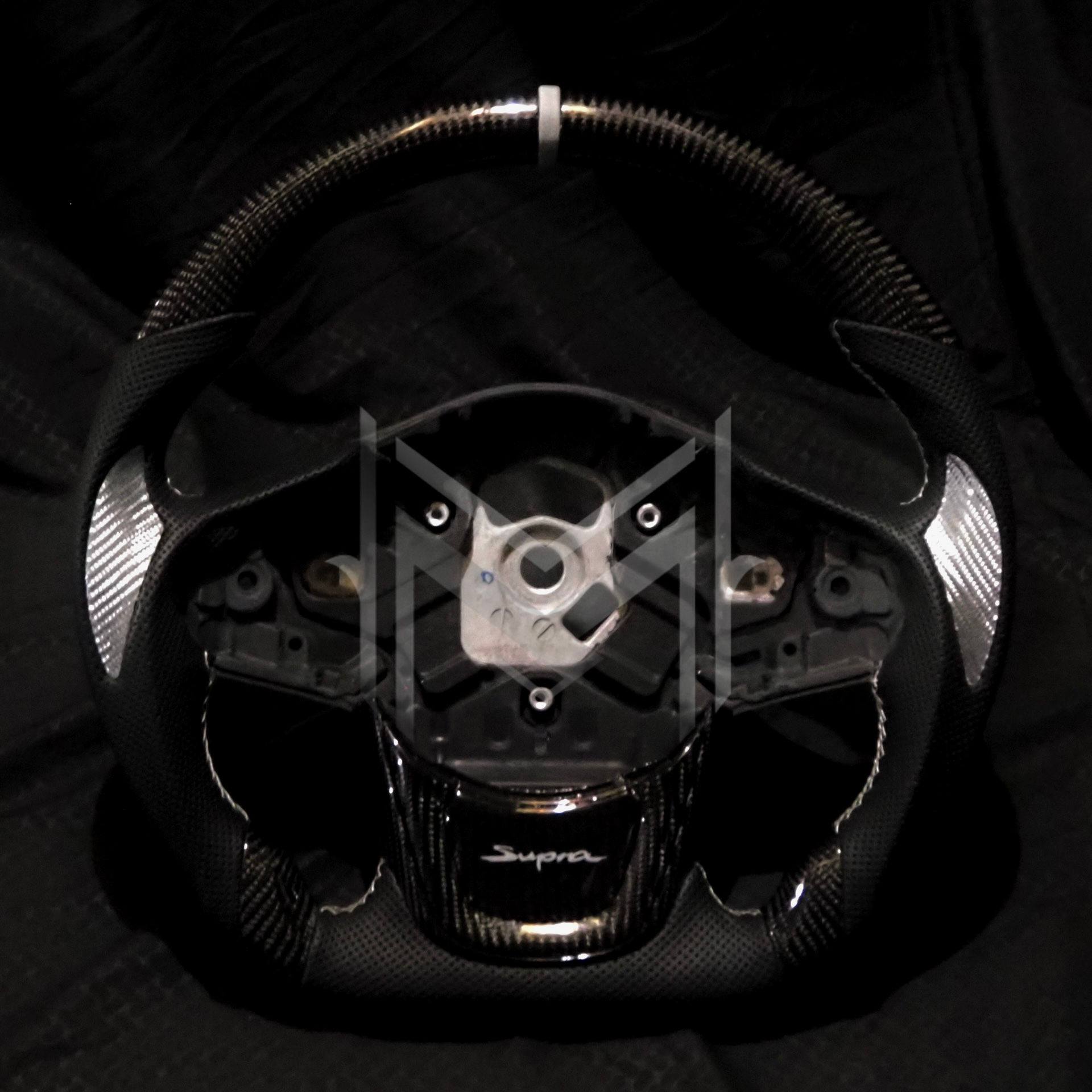A90 Supra Carbon Fiber Steering Wheel- Tri-Perforated Leather, OEM Gray Accents