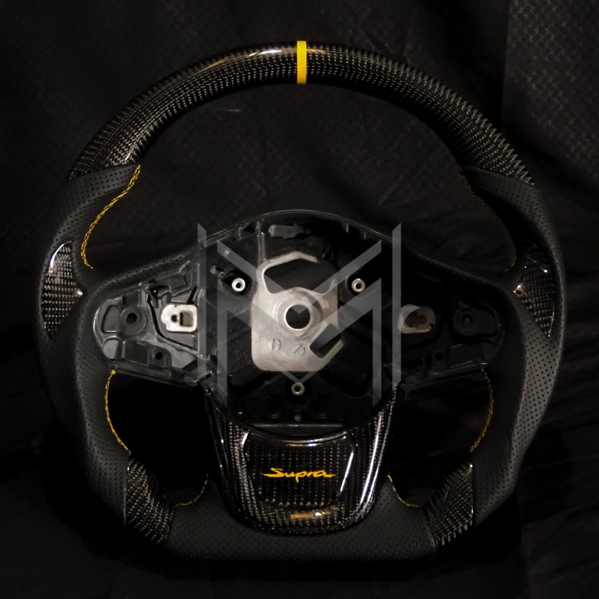 A90 Supra Carbon Fiber Steering Wheel- Tri-Perforated Leather, Yellow Accents