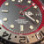 Thumbnail: Reloj  GMT rojo de acero negro