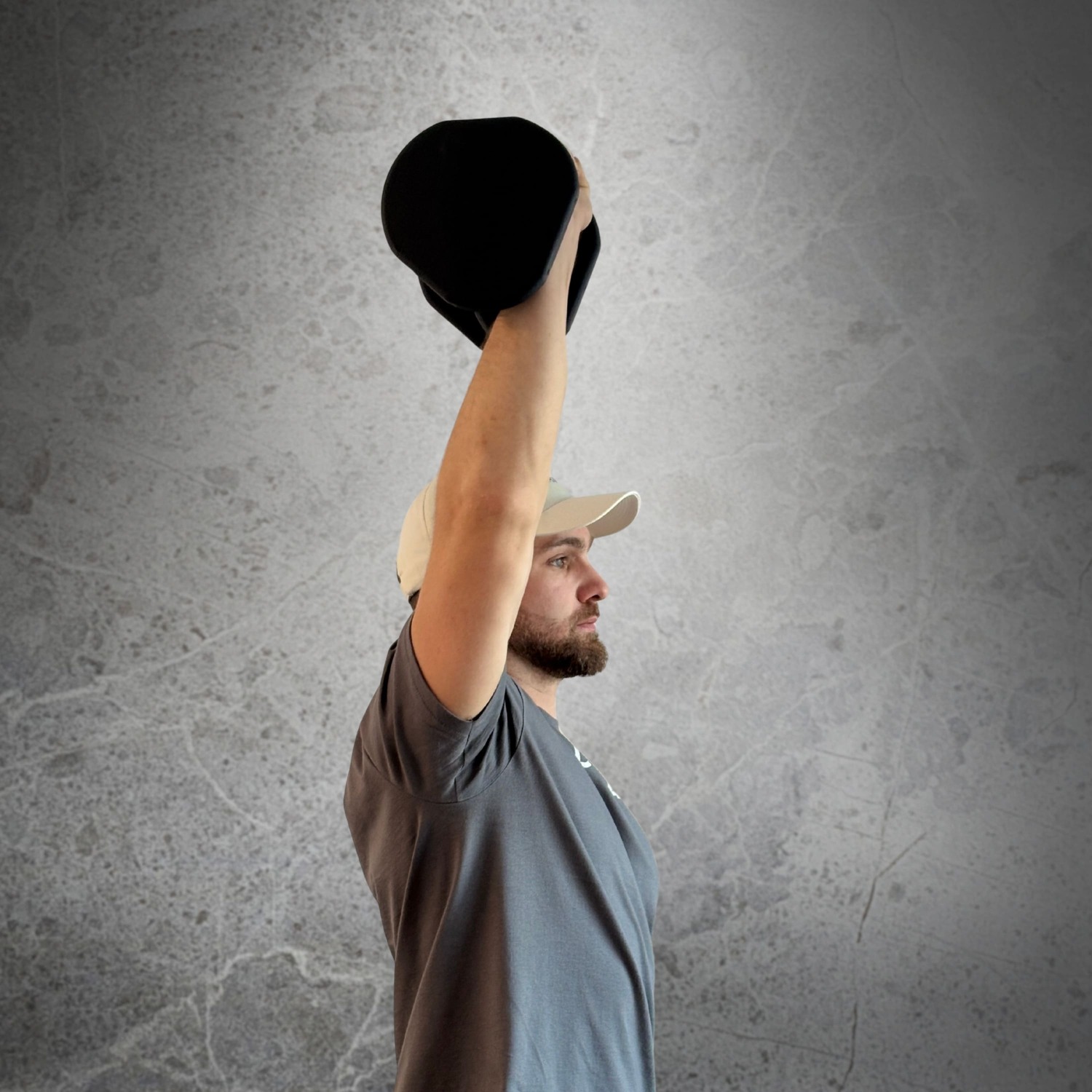 Homme faisant des Snatch avec Haltères Duhamel