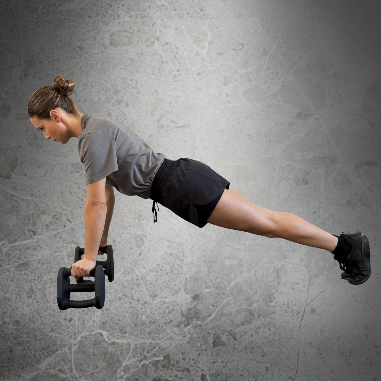 Femme faisant des Push-Up avec Haltères Duhamel