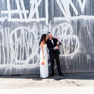 desert wedding, chapel wedding, las vegas, las vegas wedding photographer, downtown las vegas, intimate wedding, vegas elopement, wedding inspiration, vegas elopement photographer, art murals, pandemic elopement, pandemic, covid-19 wedding, las vegas strip, elopement wedding, destination wedding photographer, fun vegas elopement, champagne pop, wedding toast, fun elopement, vegas fun elopement, epic elopement, las vegas sign, iconic wedding, vintage vegas, sure thing chapel, fremont st