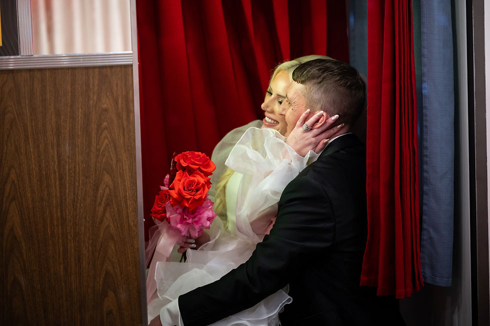 bride and groom at the Photo Booth inside sure thing chapel in Las Vegas Nevada during their Las Vegas elopement.
