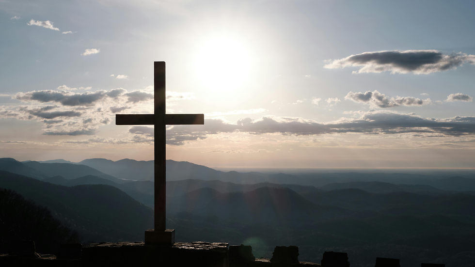 Cross on a mountain reflective of a Holy Shift.