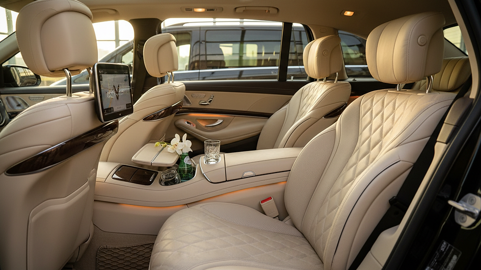 Close-up view of a luxury taxi interior with comfortable leather seats