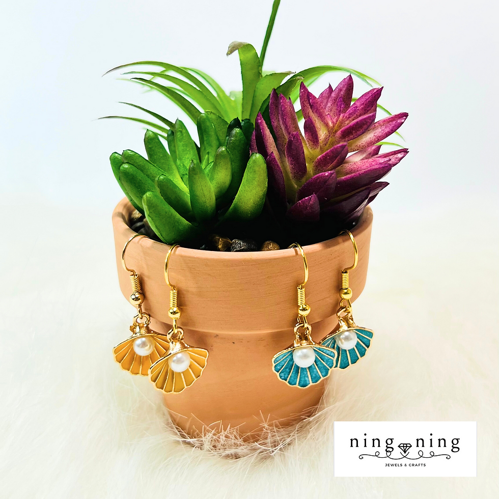 Thumbnail: Seashells and pearl dangled drop earrings