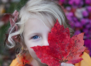 Girl with Autumn Leaf