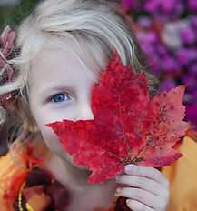 Girl with Autumn Leaf