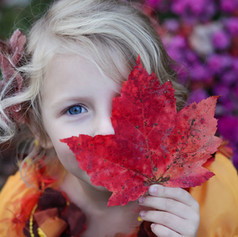 Girl with Autumn Leaf