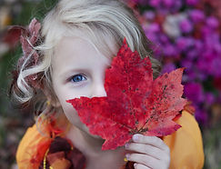 Girl with Autumn Leaf