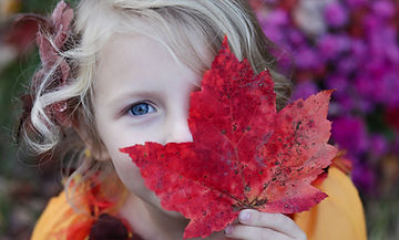 Girl with Autumn Leaf