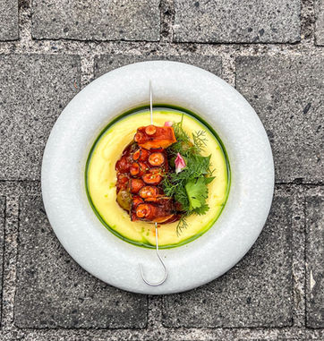 Charcoal Octopus & Potato Purée at BON Patong, a signature seafood dish with grilled octopus, creamy potato purée and contemporary Asian presentation in Phuket.