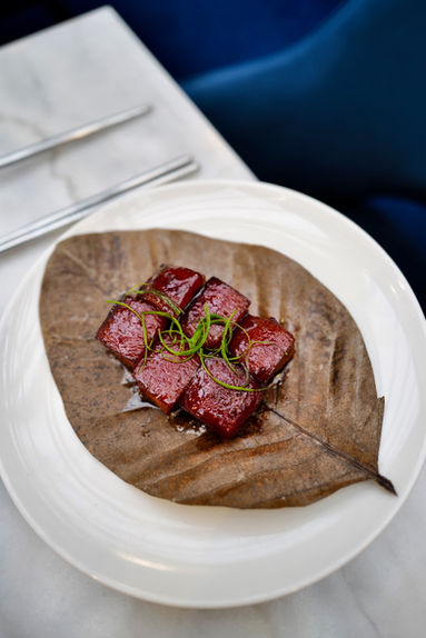 Dong Po Rou simmered to perfection, served in a refined setting at Madame Fan restaurant in Paris.