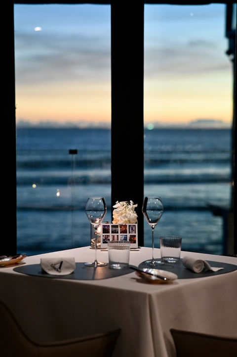 Romantic table by the sea at Michelin restaurant L’Arôme by the Sea in Phuket